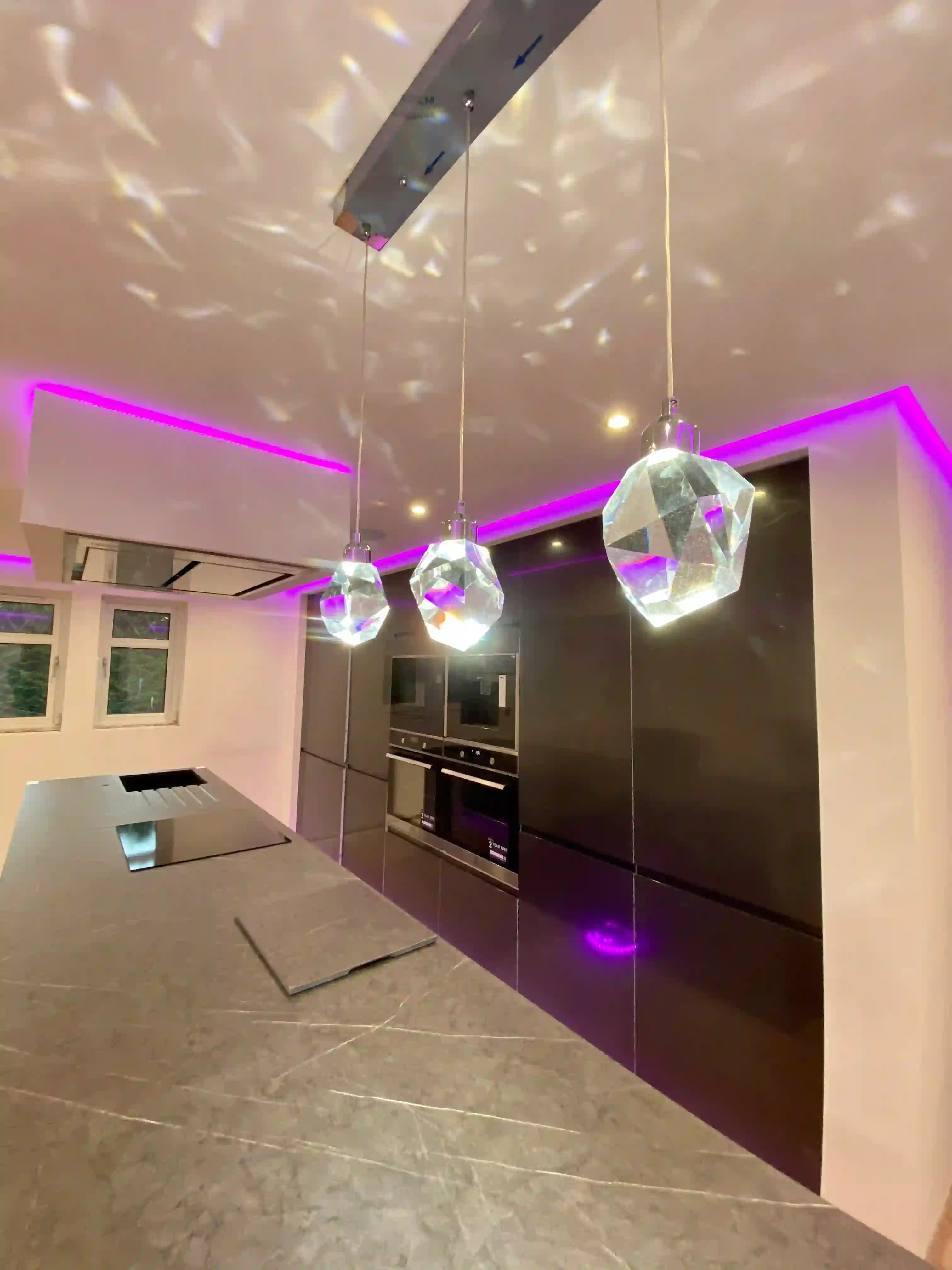 LED-lit modern kitchen by Rena Interiors